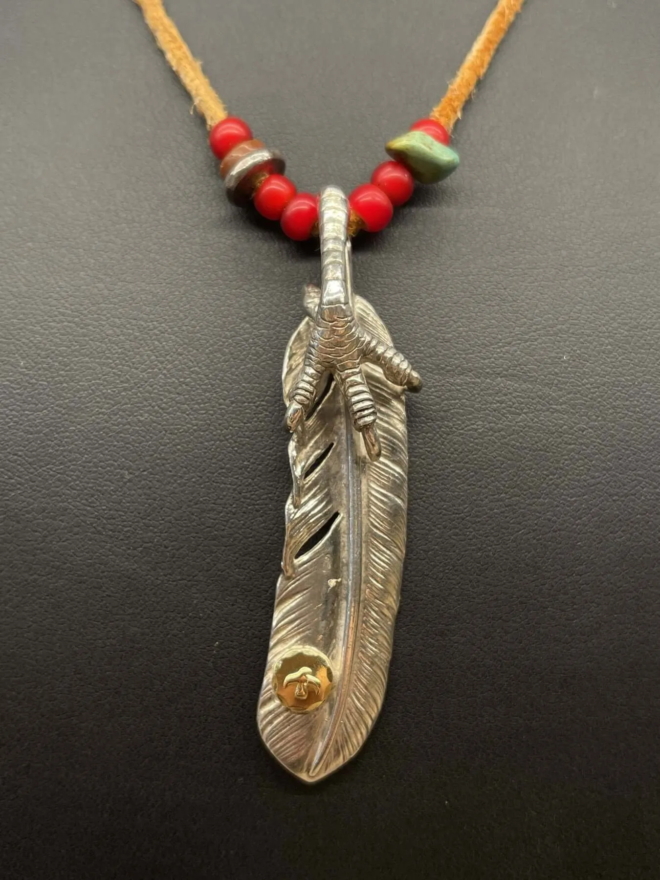 Goros Feather With Silver Claw and Leather Cord Setup